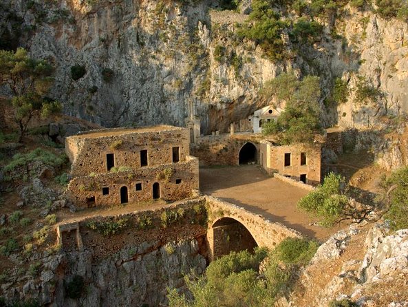 Archaeological Bus Tour to Akrotiri Excavations & Red Beach - Megalochori feels more traditional