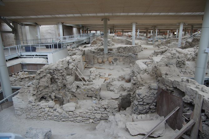 Archaeological Bus Tour to Akrotiri Excavations & Red Beach - A realistic look at the bus and pickup