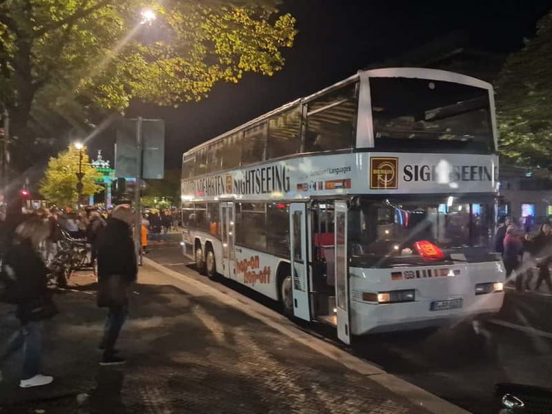 Berlin: Bus Tour by Night with Live Commentary - Friedrichstraße and Berlin’s central districts