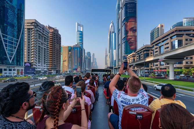 Big Bus Dubai and Abu Dhabi Twin City Ticket: Hop-On Hop-Off Tours - Heat, waiting, and the practical value of the bus