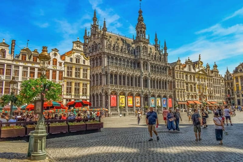 Brussels Highlights: Walking & Bus Tour with Waffle Tasting - Grand Place gives you the grand opening