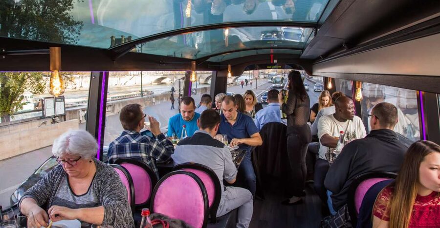 Bus Toqué Champs Elysées Tour w/ 3-Course Dinner & Champagne - Paris sightseeing from a moving dining room