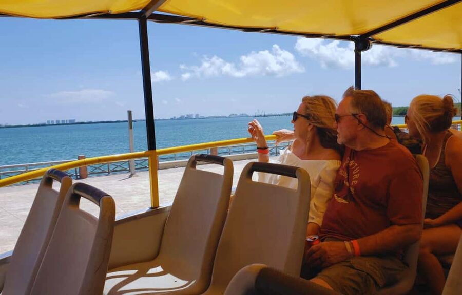 Cancun: Guided City Tour with Shopping by Double Decker Bus - Plaza 28 shows you Cancun’s downtown shopping side