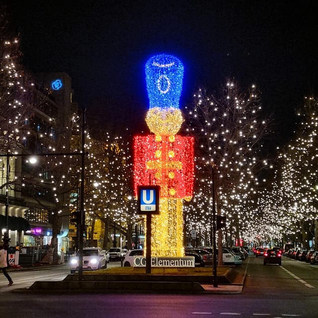 Christmas market lights tour bus through Berlin, free mulled wine (2.5 hours) - Checkpoint Charlie adds a serious note