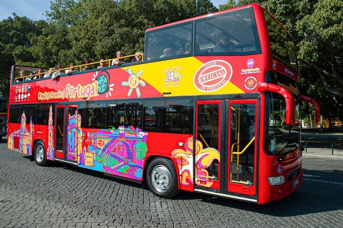 City Sightseeing Lisbon Hop-On Hop-Off Bus Tour & Bookable Extras - Audio commentary and onboard comfort