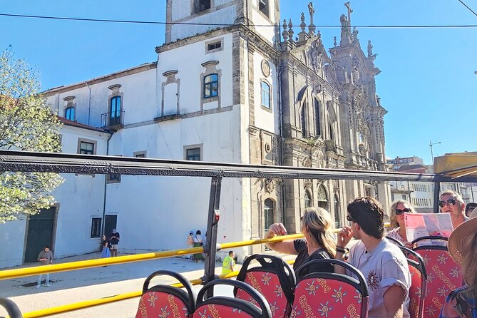 City Sightseeing Porto Hop-On Hop-Off Bus Tour - Audio commentary, views, and the uneven ride