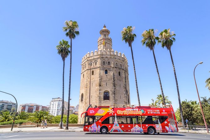 City Sightseeing Seville Hop-On Hop-Off Bus Tour - Stop 1 to Stop 4: river views, Plaza de España, and María Luisa Park