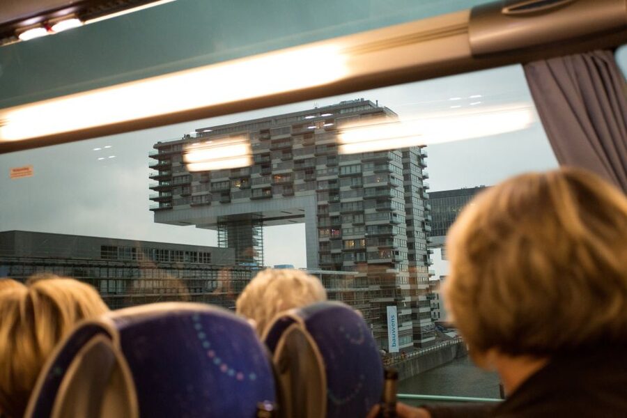 Cologne: 1.5-Hour Comedy Bus Tour - What the city information is worth