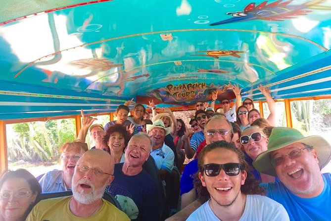 Colorful Beach Bus Sightseeing Tour of Aruba - Natural Bridge and the rough north coast