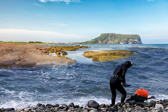 East of Jeju island Bus Tour from Seogwipo city, Jeju island - Hamdeok Beach closes the loop with bright water and sand