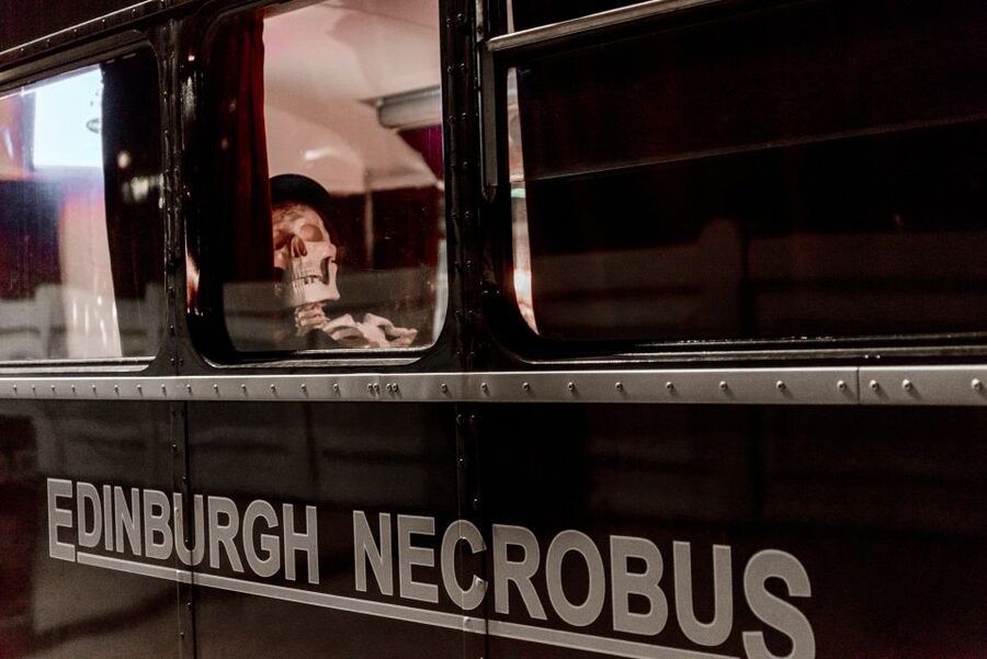 Edinburgh: Comedy Horror Ghost Bus Tour - Boarding the black Ghost Bus on George IV Bridge