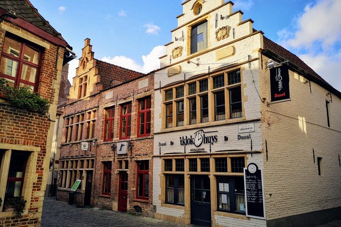 Excursion to Antwerp and Ghent by bus from Brussels with stop at the Atomium - Bridges, guild houses, and canal views