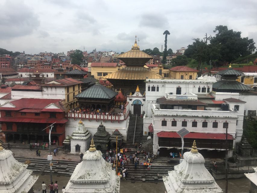 "Explore Kathmandu Rich Heritage: City Highlights Bus Tour" - Boudhanath Stupa and Buddhist Kathmandu