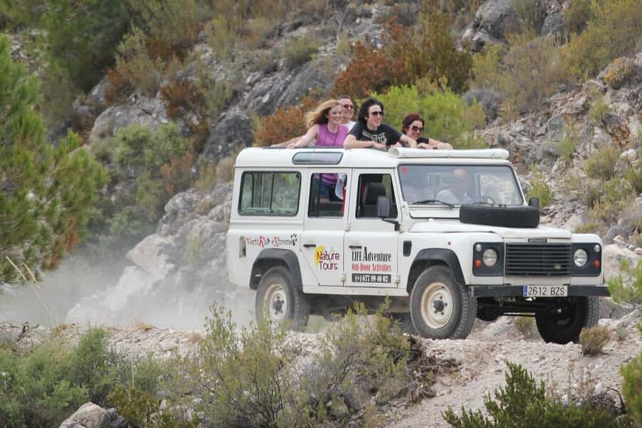 Explore the Nerja National Park nature in our open-top jeeps - Riding above the road in an open-top Land Rover