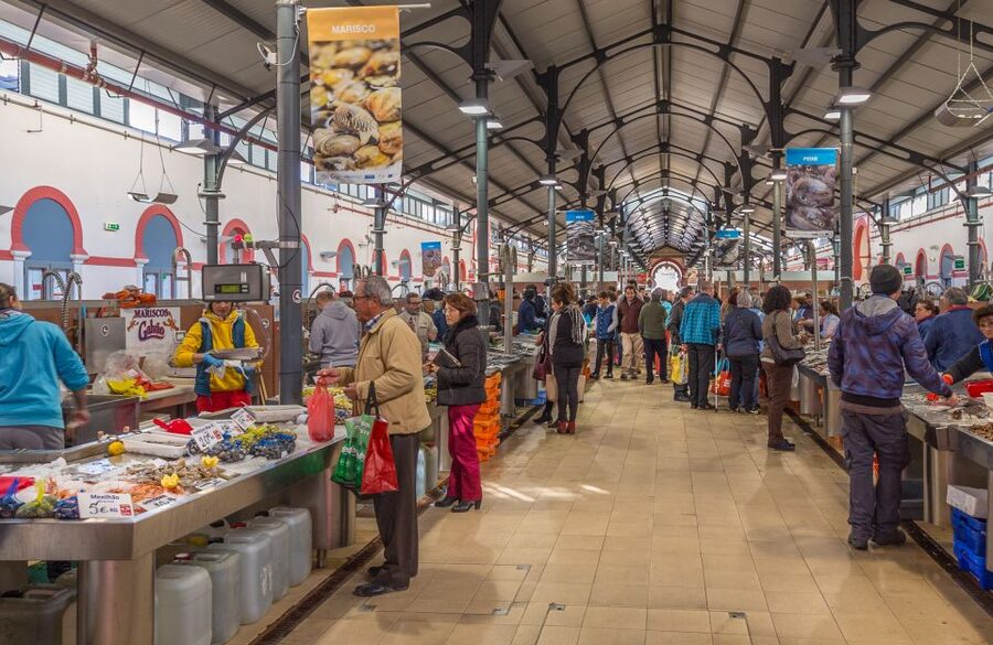 From Algarve Coast: Day Trip by Bus to Loule Market - The air-conditioned coach and hotel pickup