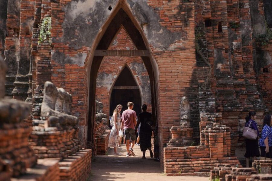 From Bangkok: Ayutthaya Historical Day Tour by Bus - Wat Mahathat and the Buddha head in the roots