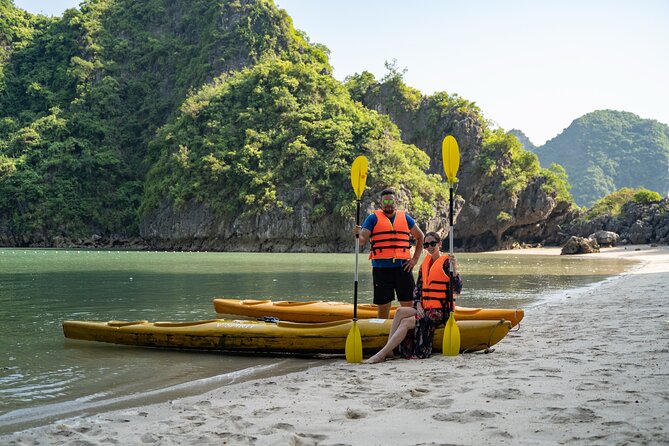 From Hanoi: 2D1N Ha Long Bay Deluxe Cruise with Bus Limousine - Sunset, dinner, and life on the boat