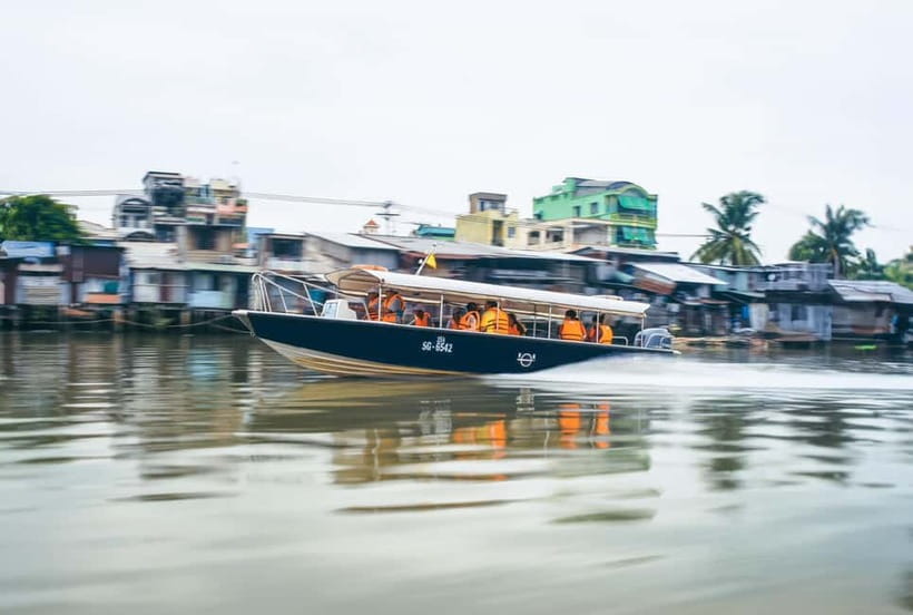 From HCM: Cu Chi Tunnels Half-Day Tour by Speedboat or Bus - Returning to Ho Chi Minh City