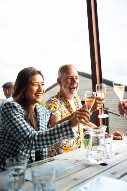From London: Vintage Bus Wine Tour with Return Train Tickets - First vineyard: tour, tasting, and lunch among the vines