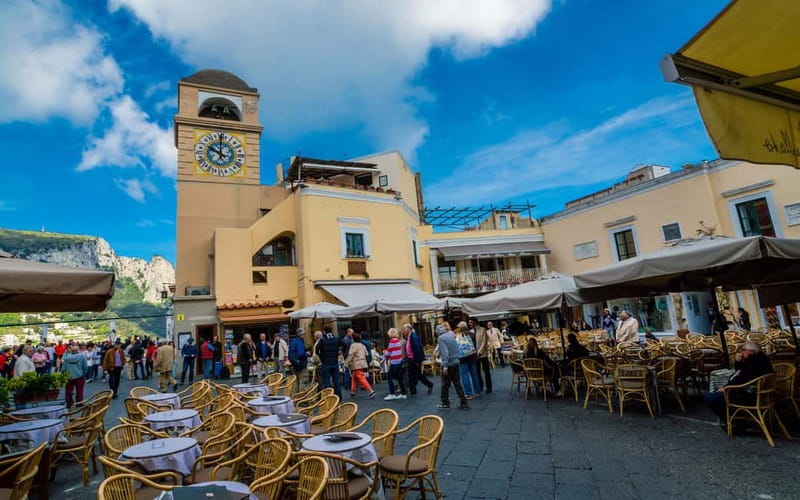 From Naples: Complete Capri Guided Boat and Bus Tour - Capri town, the Piazzetta, and Augustus Gardens