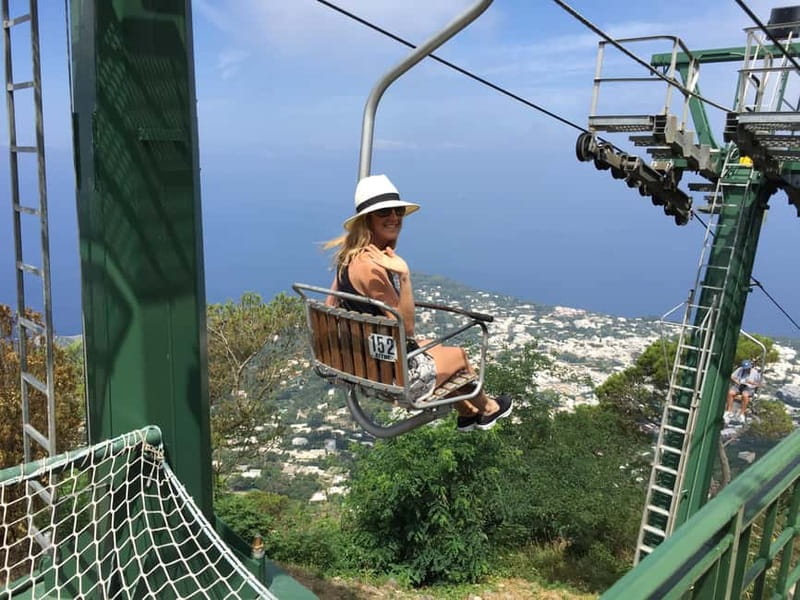From Naples: Complete Capri Guided Boat and Bus Tour - What is included, and where the extra costs appear