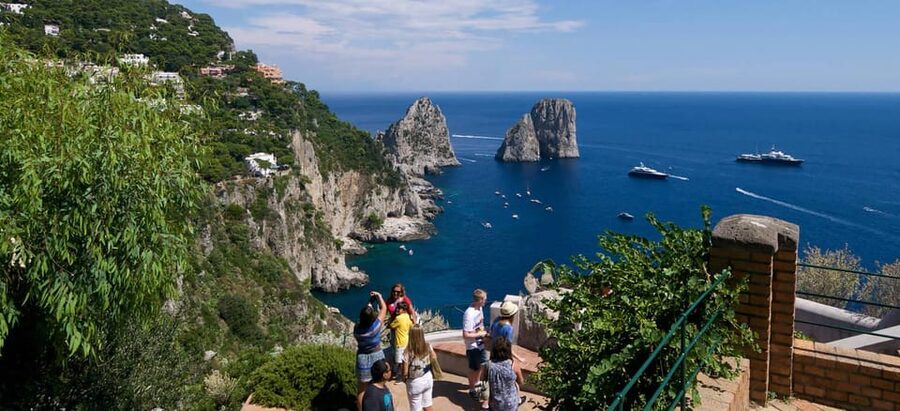 From Naples: Complete Capri Guided Boat and Bus Tour - The pace, group management, and languages