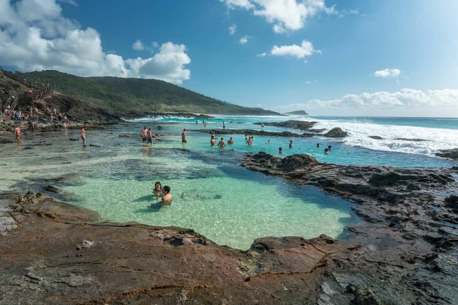 From Rainbow Beach: K'gari, Fraser Island Two-Day Coach Tour - Indian Head and Champagne Pools bring you back to the sea