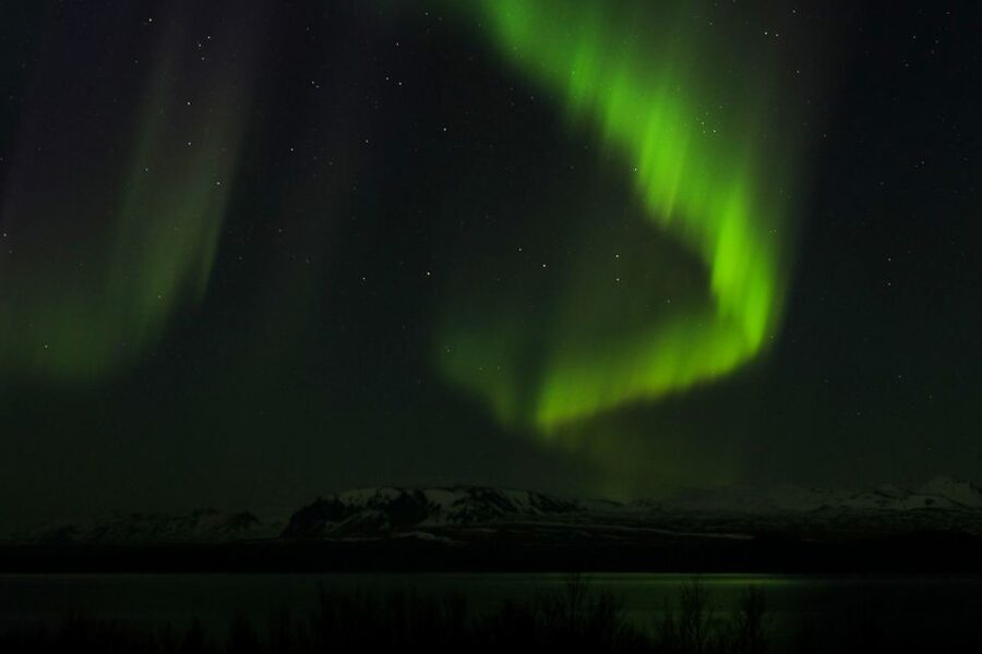 From Reykjavik: Northern Lights Bus Tour with Hot Cocoa - The free retry and what it really means