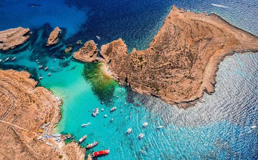 From Sliema: Gozo, Comino & The Blue Lagoon Boat & Bus Tour - Sailing north along Malta’s coast