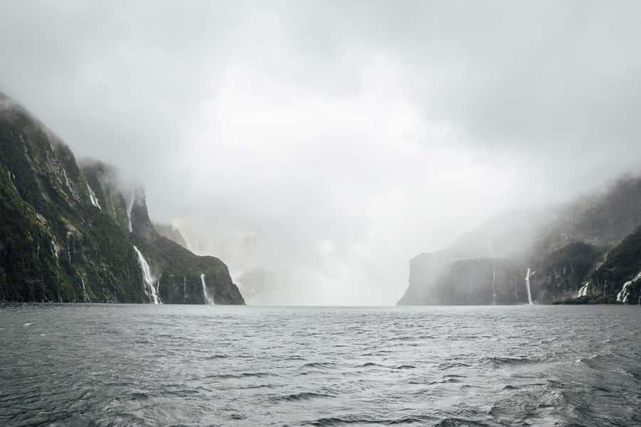 From Te Anau: Milford Sound Coach Tour and Cruise - Boarding the catamaran at Piopiotahi