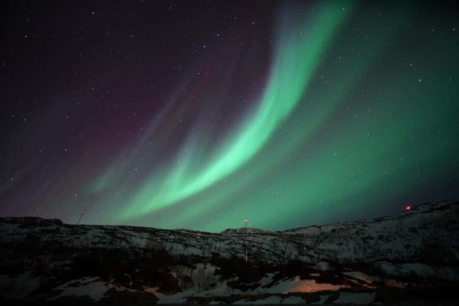 From Tromsø: Aurora Bus Tour with Snacks, Photos, and Drinks - Chasing clear skies beyond Tromsø