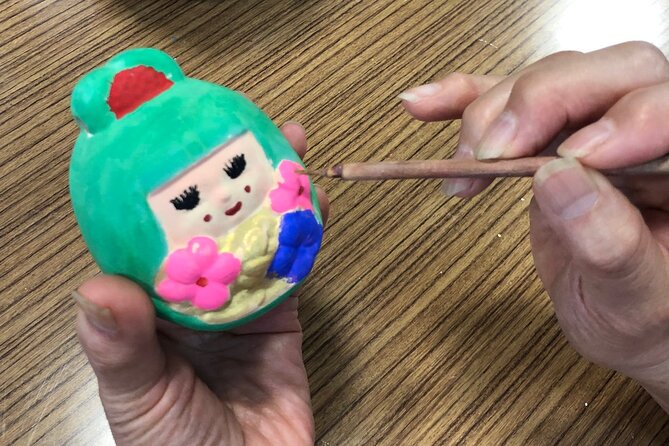 Fukuoka Open Top Bus and Hakata Doll Painting Experience with Guide - Meeting at Fukuoka City Hall in Tenjin