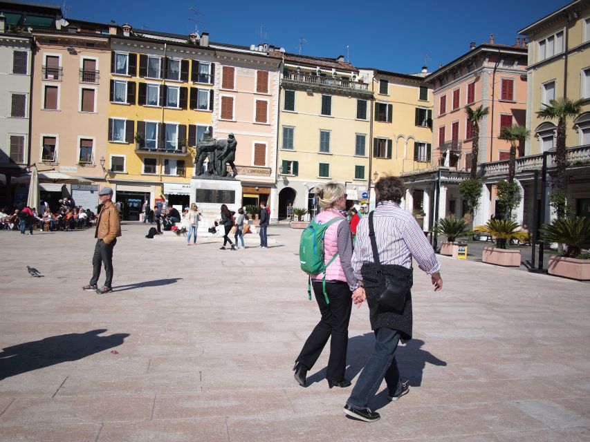 Full-Day Lake Garda Tour: Bus & Public Boat with Guide - Timing, meeting points, and practical limits