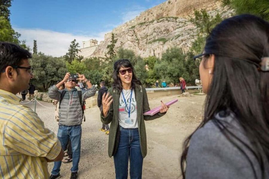 Guided walking tour of Acropolis with bus city tour - Walking through the Acropolis monuments