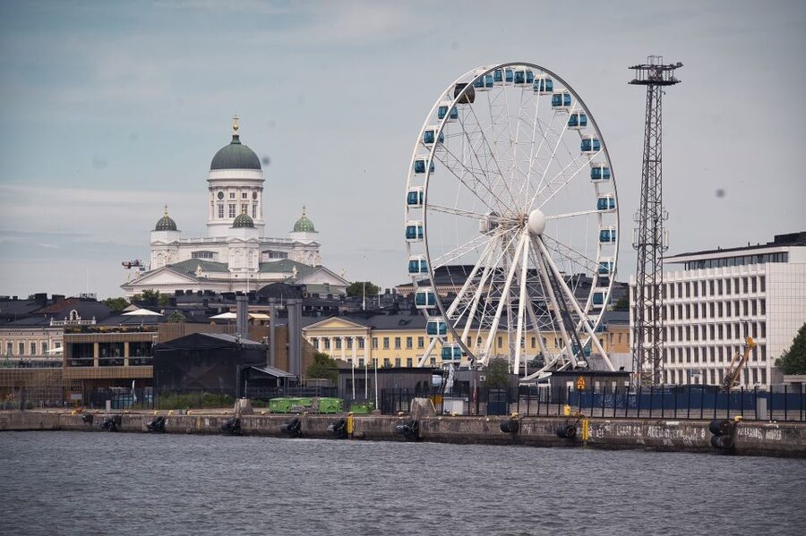 Helsinki: Hop-On Hop-Off Bus Tour & City Highlights Cruise - Suomenlinna appears from the water