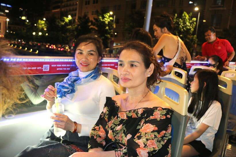 Ho Chi Minh City: Late-Night Open-Top Bus Tour - Ben Thanh, Bitexco, and the river after midnight