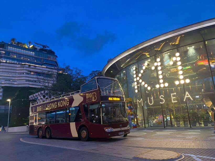 Hong Kong: Panoramic Night Tour of Kowloon by Open-top Bus - Hong Kong at night from the top deck