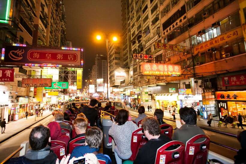 Hong Kong: Panoramic Night Tour of Kowloon by Open-top Bus - Nathan Road and Canton Road after sunset