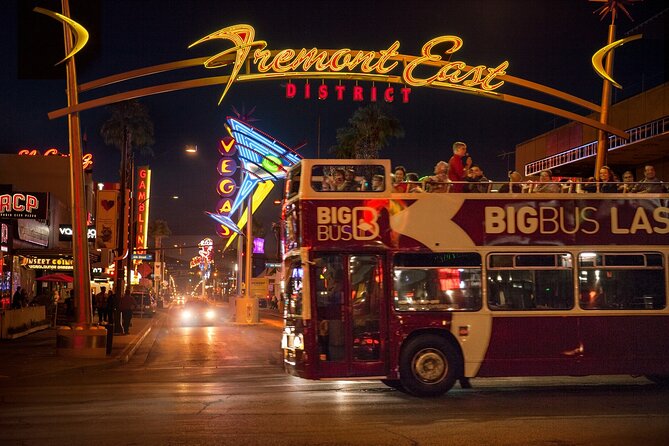 Las Vegas After Dark: Adult-only Night Tour with Free Drink - Riding above the Strip on the open-top deck