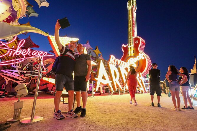 Las Vegas: Neon Museum Night Experience and Open-Top Bus Tour - The Neon Museum at night