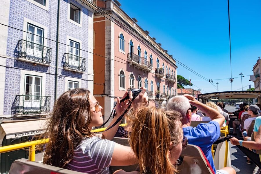 Lisbon: City Sightseeing Hop-On Hop-Off Bus Tour - Add-ons: walking tours, night bus, and boat trip