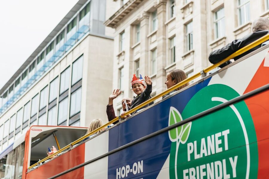 London: Children's Open Top Bus Tour - Pall Mall and the return to Royal Opera Arcade