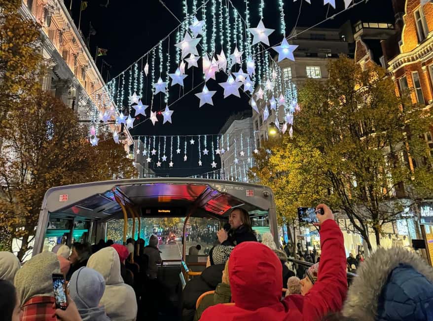 London: Christmas Lights Bus Tour With Live Guide - From London Eye or Victoria into the festive center