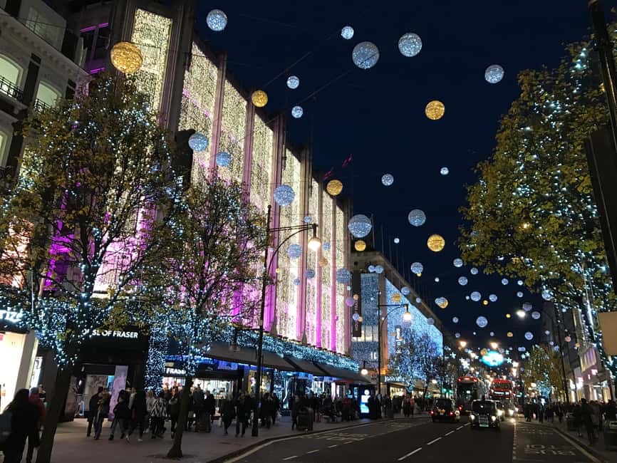 London: Christmas Lights Open-Top Bus Tour - Piccadilly Circus brings screens and city energy