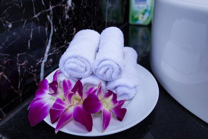 Luxury Halong Bay 1 Day on Cruises From Hanoi with Bus & Lunch - Titov Island, swimming, and changing clothes
