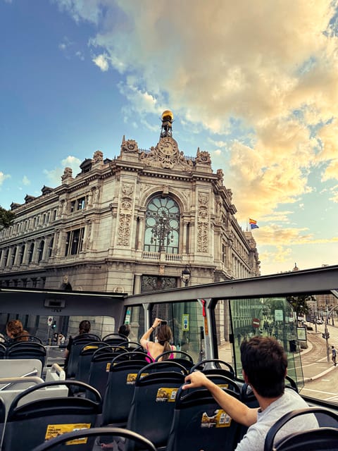 Madrid: Panoramic Open-Top Bus Day or Night Tour with Guide - Plaza Colón and the grand sweep toward Cibeles