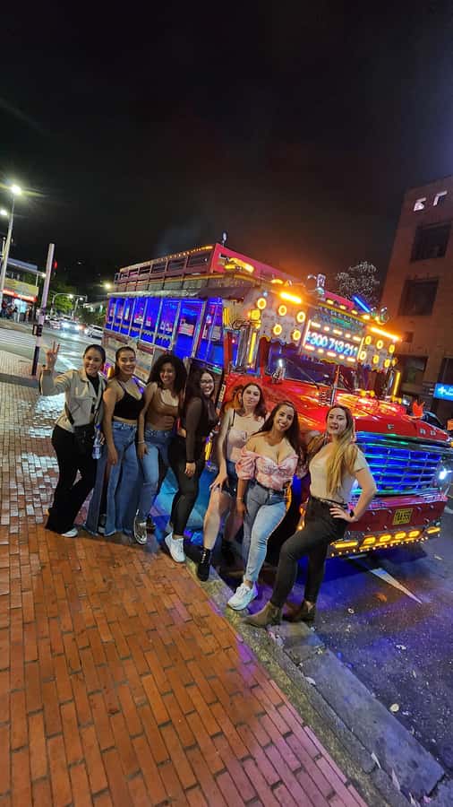 Medellin: Party Bus with DJ & Street Food Tastings - A moving start in El Poblado