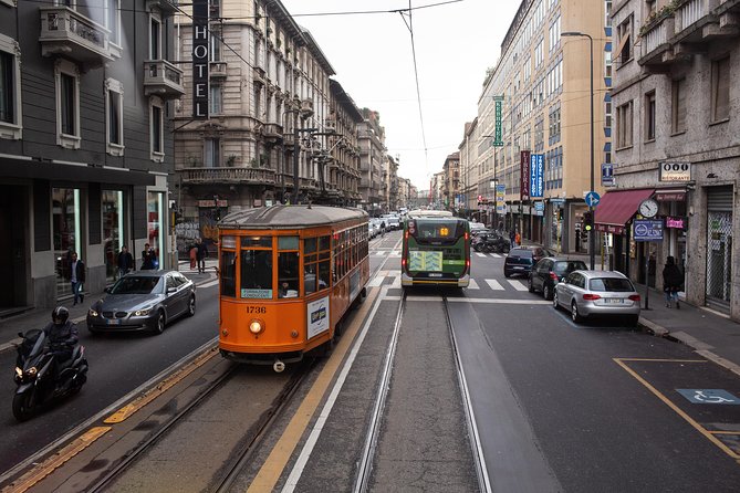 Milan Hop-On Hop-Off Bus Tour with Four Routes - The audio guide, seats, and bus ride