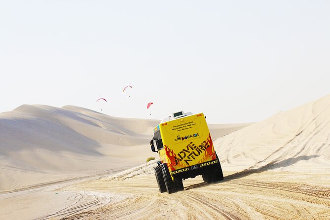 Monster Bus desert adventure: Dune bashing and sandboarding - Al Majles Resort, refreshments, and Arabian oryx