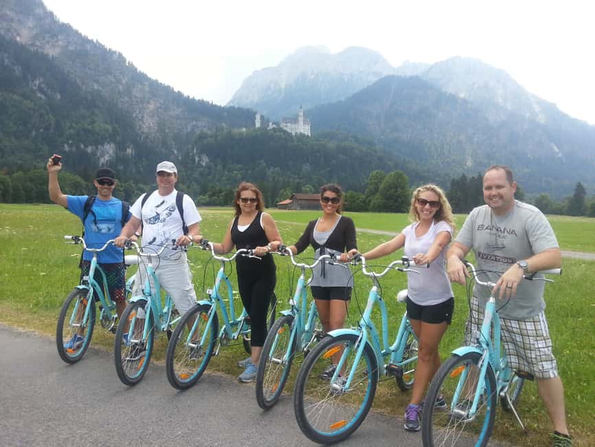 Munich: Neuschwanstein Castle by Bus with Alpine Bike Ride - Walking up to Neuschwanstein Castle